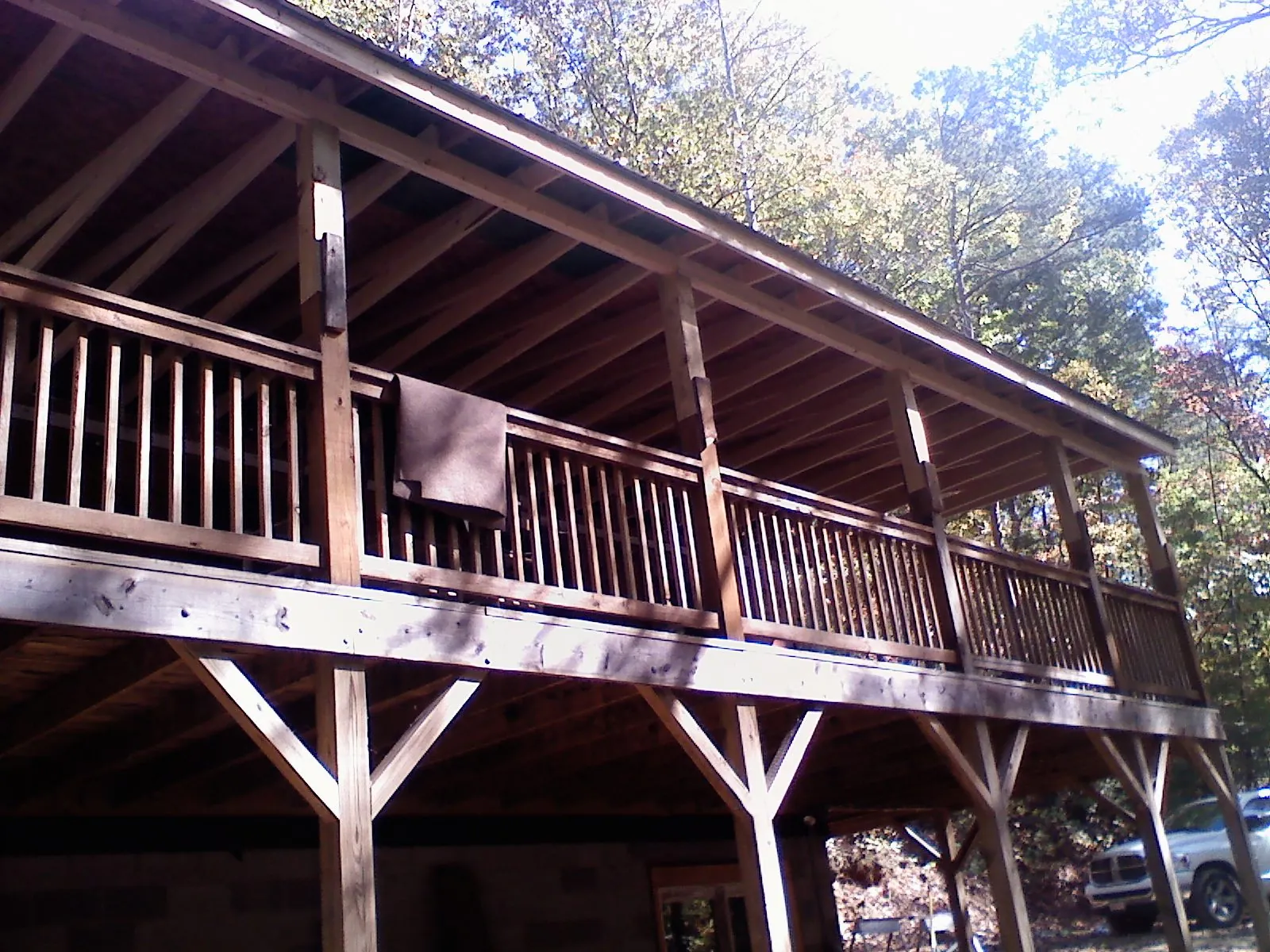 Timber framing under a new elevated porch and deck — Roof Leak Repair in Louisburg by Roofing Brothers